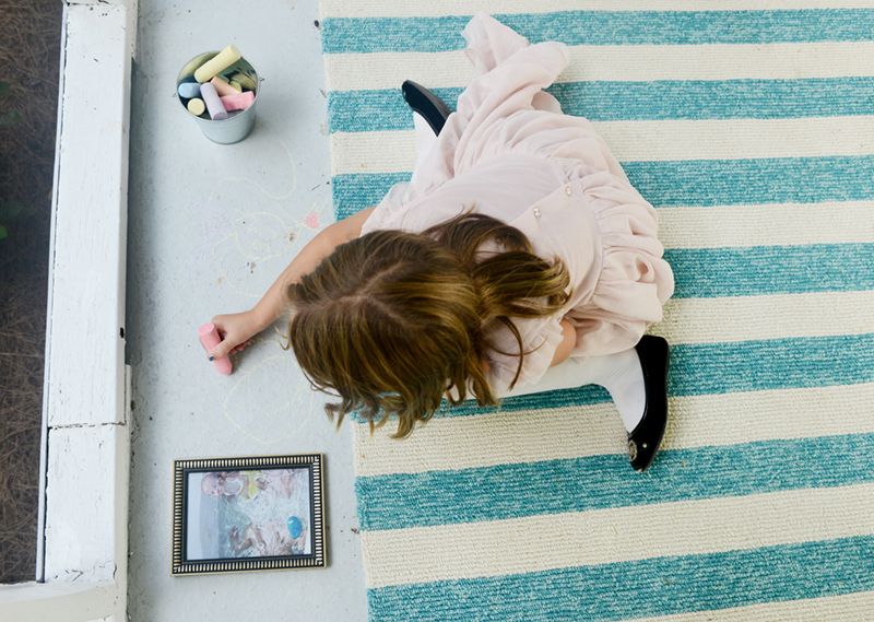 Child playing with chalk